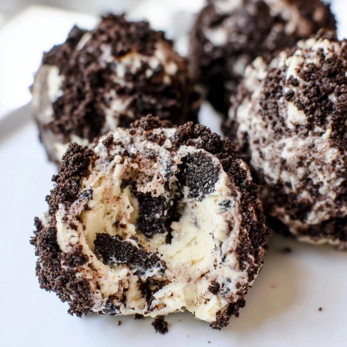 These no-bake Cream Cheese Oreo Protein Balls look like mini desserts.