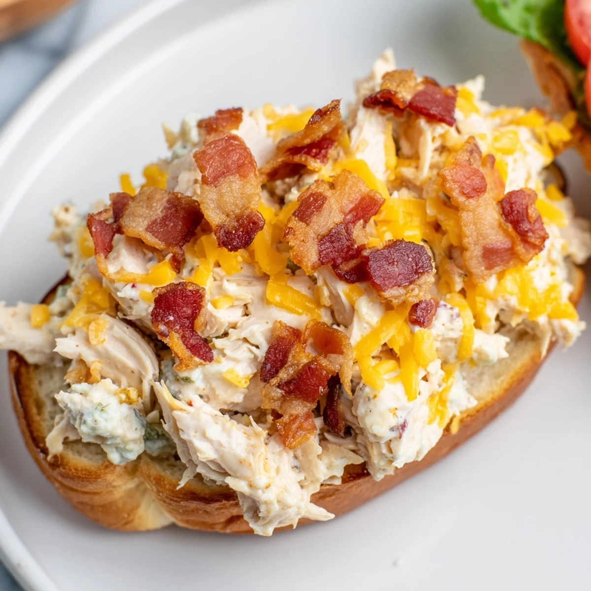 Crack Chicken Sandwiches piled on brioche, creamy cheesy filling melting, bacon crisp